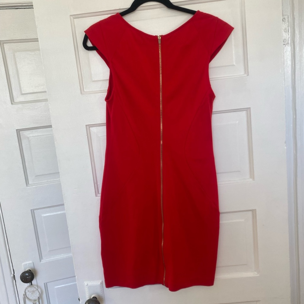 Red Express bodycon dress with cap sleeves and gold zipper down back! Size 10